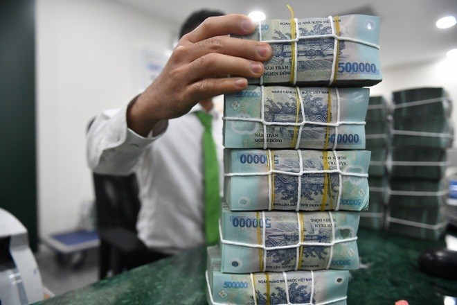 Ngân hàng đã “bơm” gần 926.000 tỷ đồng vào bất động sản